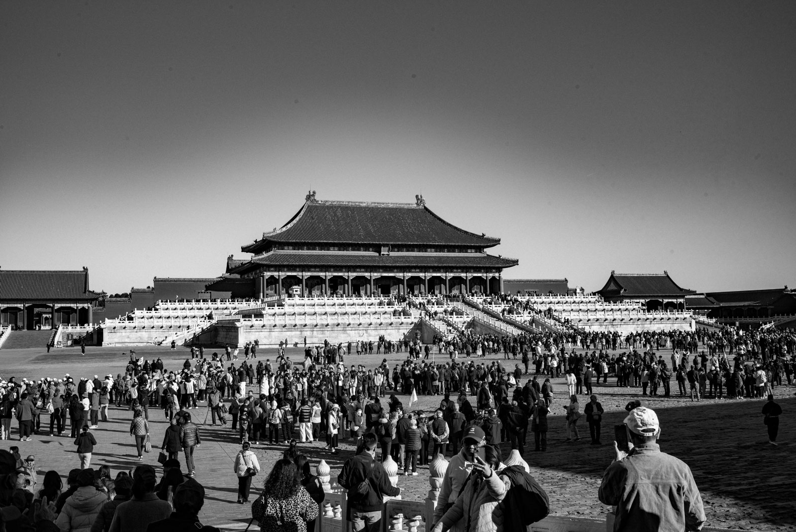 Crowds crossing the courtyard of the Forbidden City